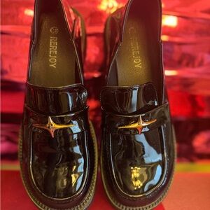 Shiny Black Loafers with Gold Detail